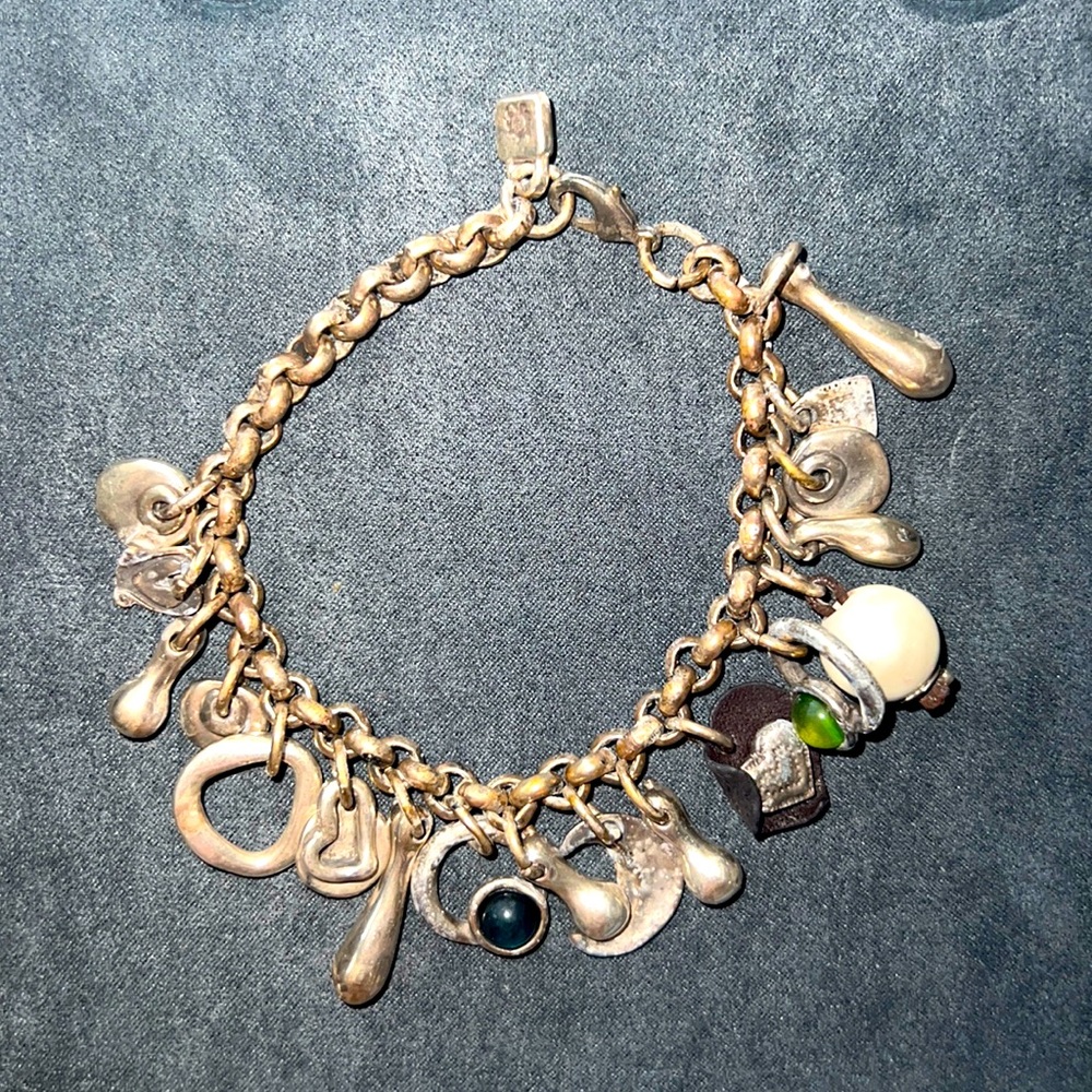 Uno de 50  Sterling Silver charm bracelet - One Size - good condition